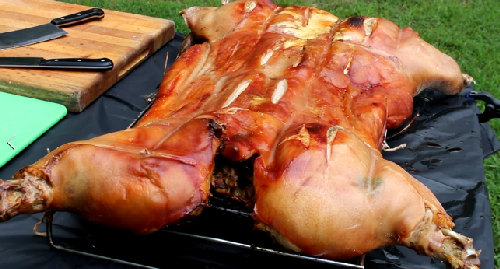 Bill Brown roasts a pig every Saturday during the football season at There, a gastropub located in the Atlanta suburb of Brookhaven.


