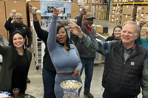 Holiday potluck celebration in the showroom