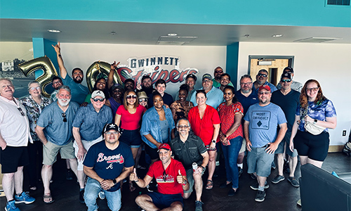 ACityDiscount Staff celebrating 50th anniversary